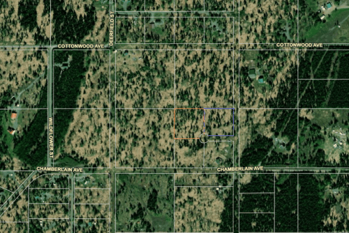 Aerial view of the 2.23-acre Wolverine Flats Lot 61 in Kenai Peninsula Borough, Alaska, showing surrounding natural landscape.