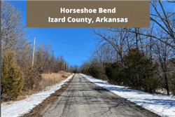 Aerial view of Arkansas Izard County Horseshoe Bend 0.29-acre lot, showcasing surrounding landscape and terrain.