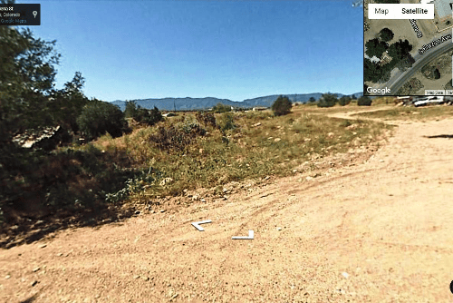 Aerial view of Colorado Fremont County 0.13-acre lot 8, with surrounding land and natural landscape near Florence.