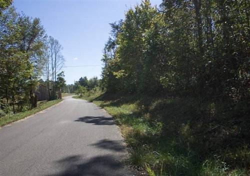 Six.97-acre property in Pulaski County, Kentucky near Upper Line Creek with electricity access, offered by Onlinelandsales.