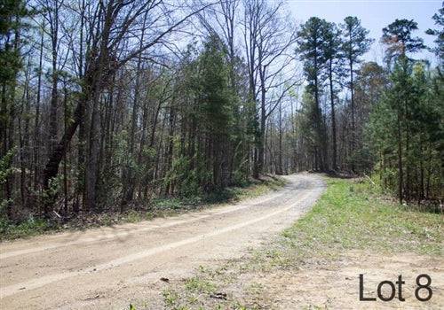 Aerial view of Kentucky Rock Castle County 7.04-acre Chestnut Oak Ridge Lot 8, showing wooded land and natural landscape.
