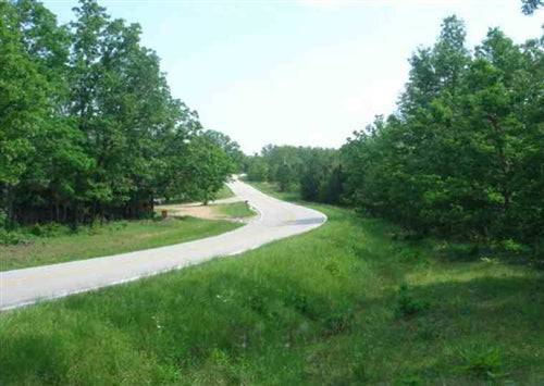 Aerial view of Missouri Dent County Deer Valley Lot 16, 22.42-acre rural land parcel with trees and open space.