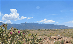 Aerial view of New Mexico Rio Grande Estates Lot 1 Unit P Block 1120, Valencia County, showing surrounding land and desert terrain.