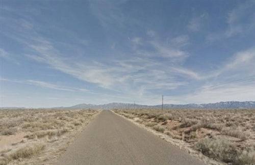 Aerial view of Valencia County acreage lot 4, unit 3, block 41 in Rio Del Oro, New Mexico, with surrounding land and natural landscape.