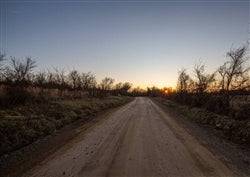 Aerial view of Pittsburg County, Oklahoma, 5.35-acre Painted Horse lot with visible land boundaries and electrical hookups.