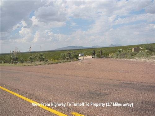 Aerial view of 5-acre land parcel in Hudspeth County, Texas, showing open desert terrain and sparse vegetation.