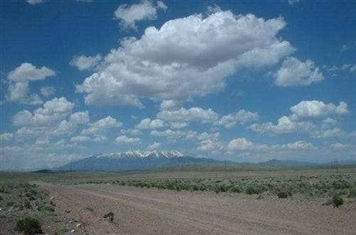 A scenic view of Mount Blanca in Alamosa County, Colorado, with 5-acre ranch land in the Mount Blanca Valley.