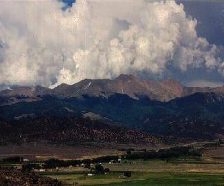 Aerial view of two 5-acre adjoining land parcels in San Luis Estates South, Costilla County, Colorado, showing open grassy terrain.