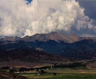 Aerial view of Colorado's San Luis Estates South, 5.1-acre property in Costilla County with open land and scenic surroundings.