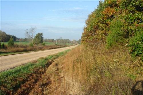 Aerial view of Missouri Dent County Valley View Ranch, 3.1 acres, featuring rolling terrain and scenic landscape.