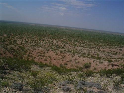 Aerial view of 20-acre Texas Reeves County land near Pecos, available for purchase with installment terms, shown in the image.