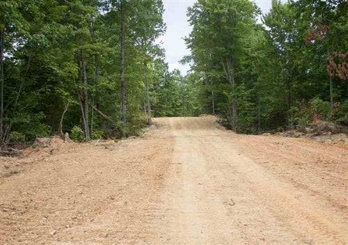 Aerial view of 6.01-acre Buck Run Ridge lot 32 in Wayne County, Kentucky, showing wooded terrain and surrounding landscape.