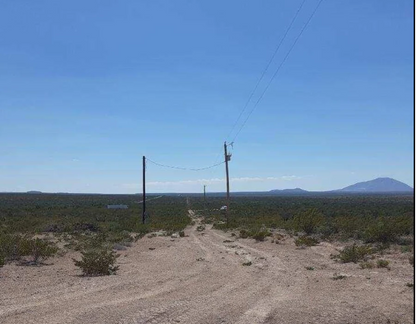 Aerial view of Texas Hudspeth County land parcel, showing open desert landscape with sparse vegetation on the 0.14-acre lot.