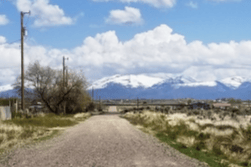Aerial view of Nevada Meadow Valley Ranchos Lot 16, Unit 8, Elko County, showing open land and surrounding natural landscape.