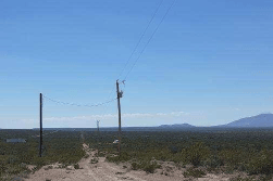 Aerial view of Texas Hudspeth County Eastern Hills Lot 9, a 0.14-acre property with surrounding desert landscape.