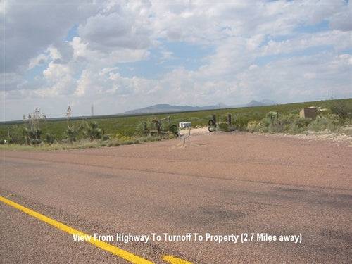 Aerial view of 5-acre Vista Heights land in Hudspeth County, Texas, showing open desert terrain and distant mountain background.
